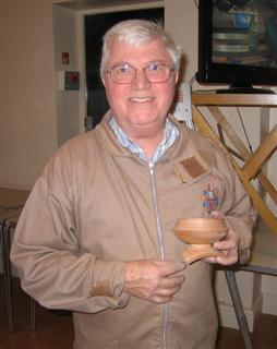 Brian with the finished bowl and tree legged base